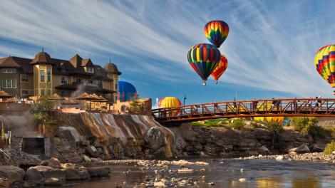 Colorful hot air balloons floating over Pagosa Springs, Colorado