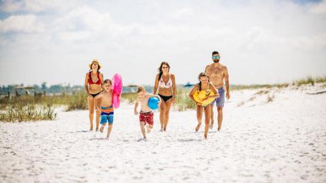 Visitors spending a day of sun and sand of Panama City Beach, Florida