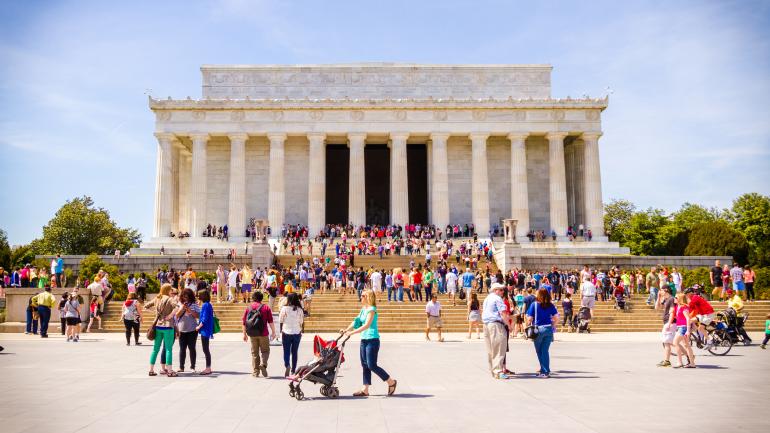 A colorful crowd visiting the Lincoln Memorial