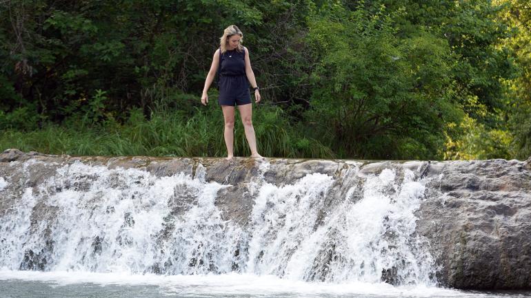 Wading atop Little Niagara, a small waterfall in the Chickasaw National Recreation Area