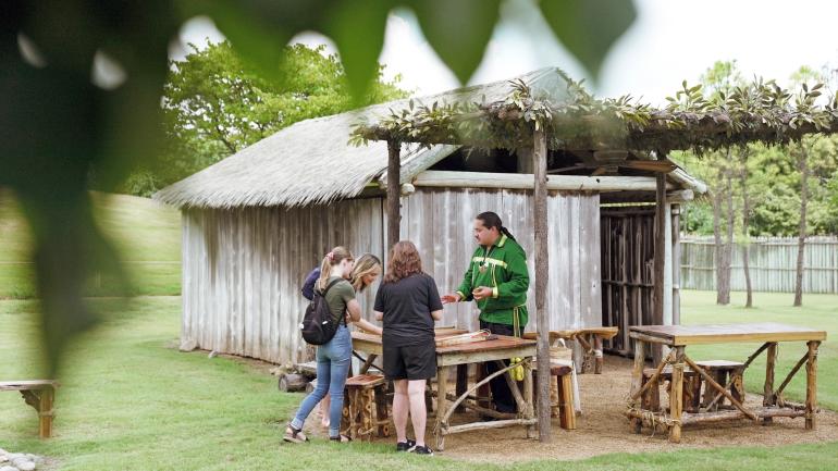 A hands-on demonstration in the Traditional Village at the Chickasaw Cultural Center