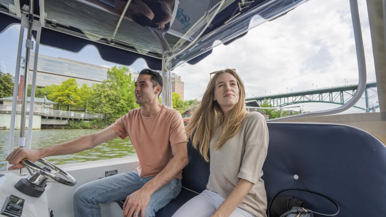 Boating down the Tennessee River through downtown Knoxville, Tennessee