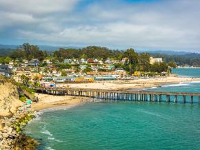 Pier and colorful houses at Capitola Beach Pier and colorful houses at Capitola Beach
