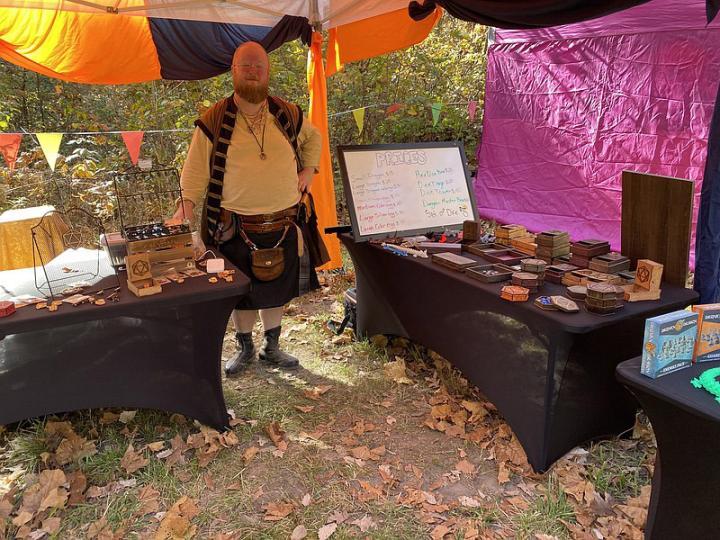 A vendor selling goods at the Central Missouri Renaissance Festival 