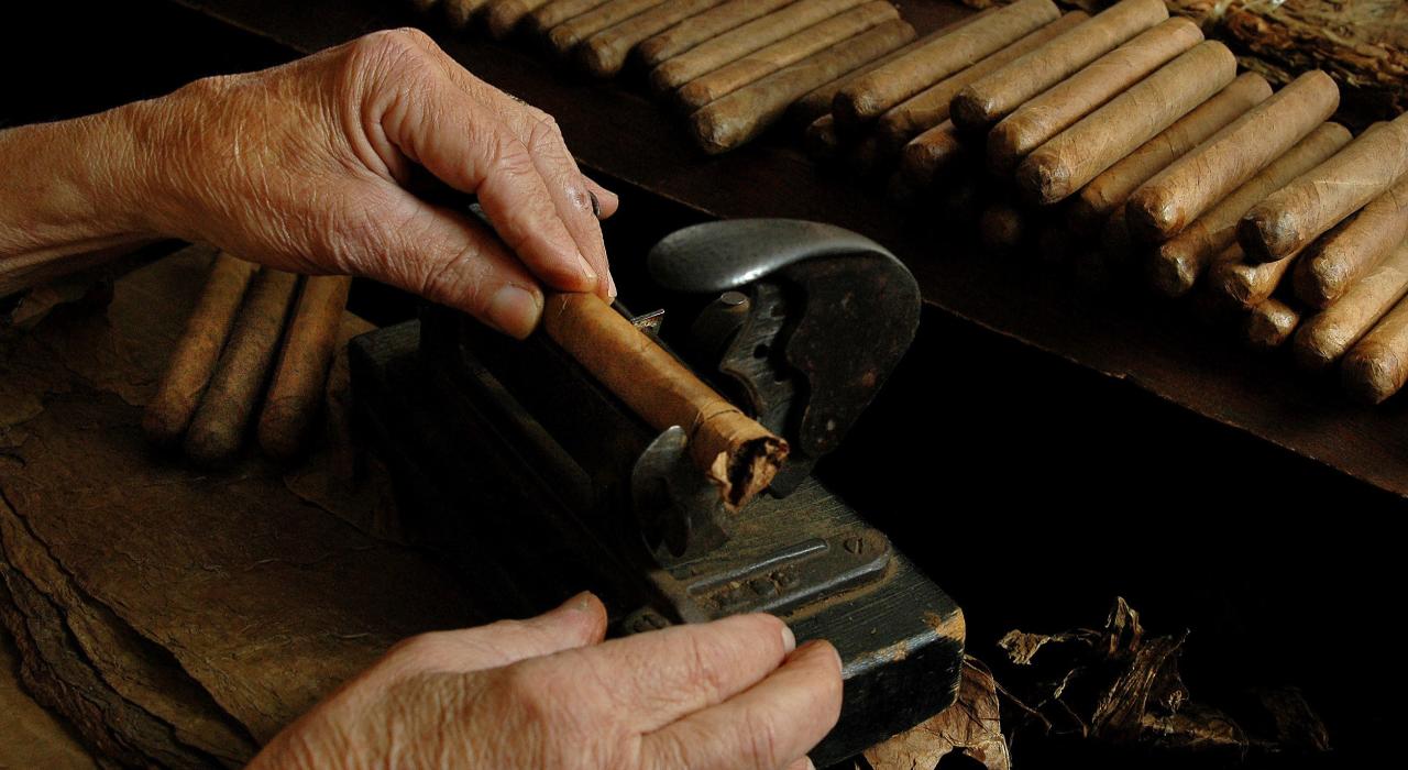 Rolling cigars by hand in Ybor City, Florida