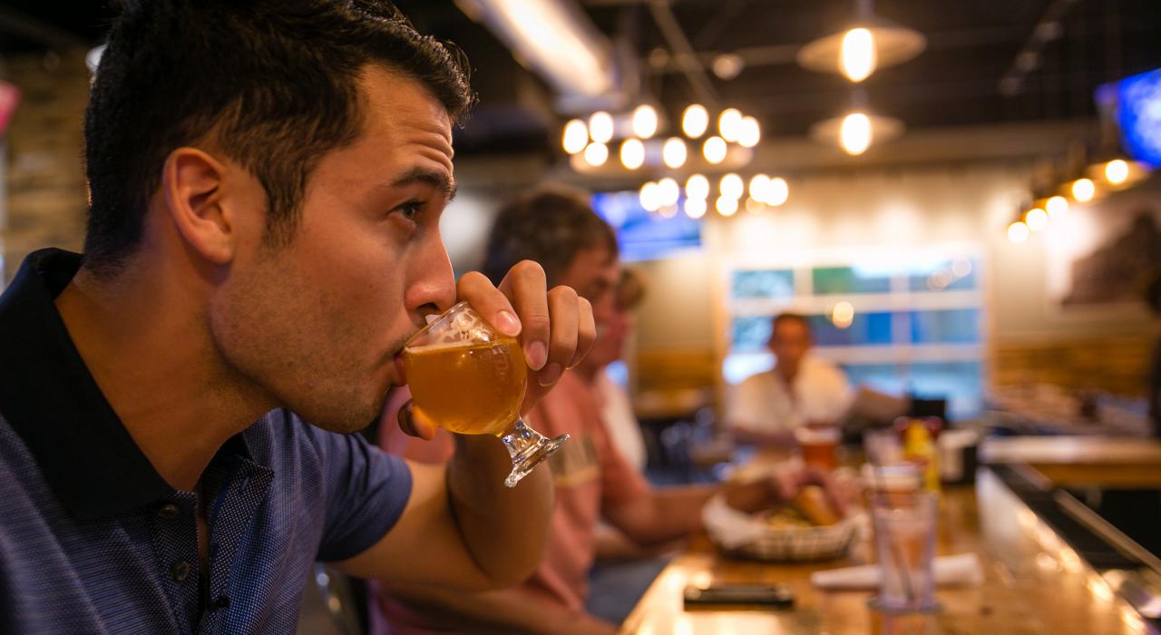 Sampling a signature beer at the Lansing Brewing Company.