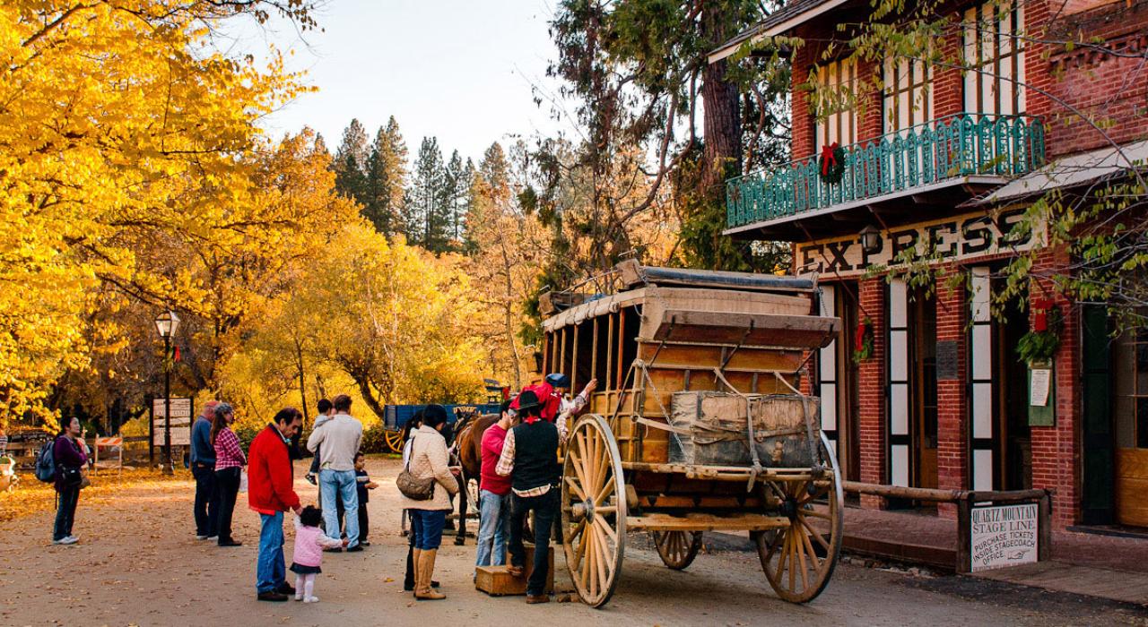 Visitors prepare to take a stagecoach ride through Columbia State Historic Park 