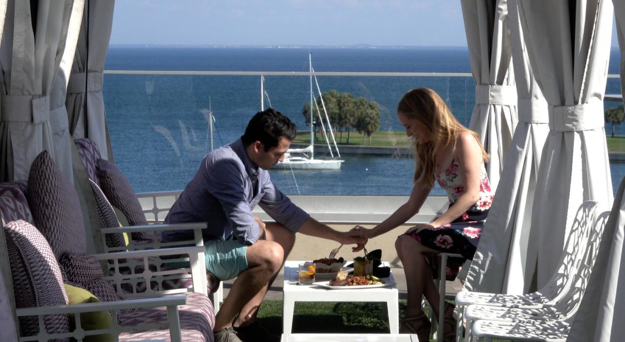 Couple dining with a view from The Canopy at the Birchwood in downtown St. Petersburg, Florida