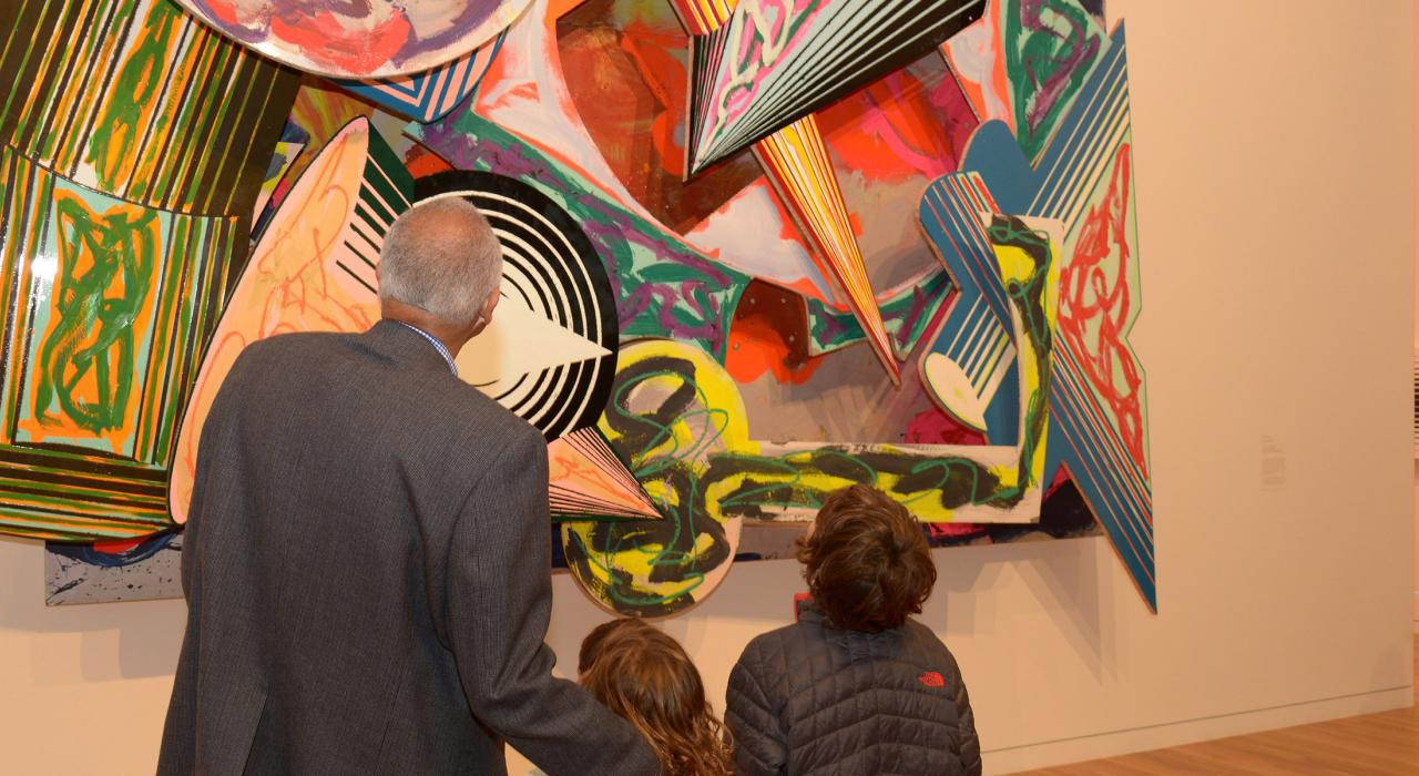 Viewing a colorful piece at the Columbus Museum of Art