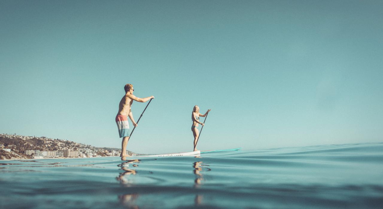 在主海滩体验桨式冲浪