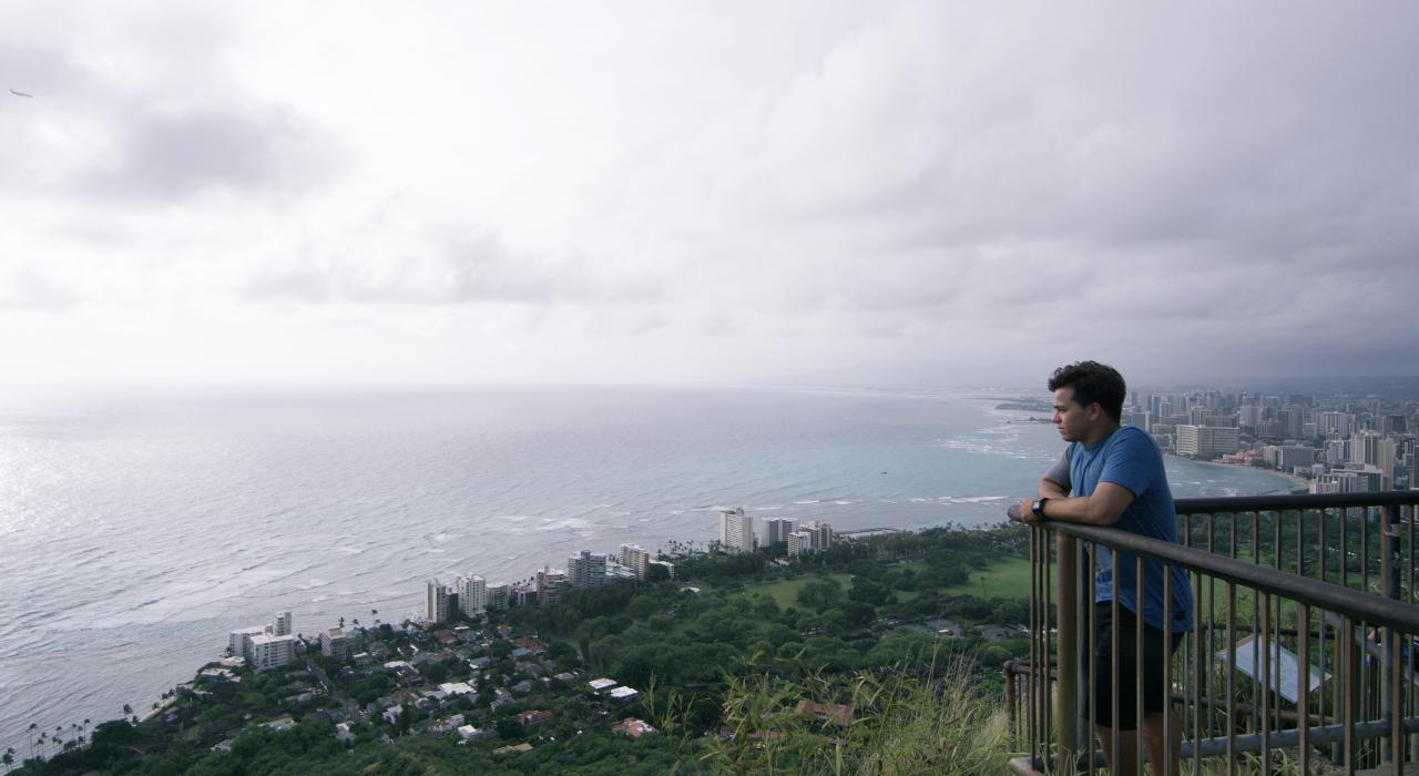 Keanu Asing overlooking Oahu, Hawaii, from Diamond Head